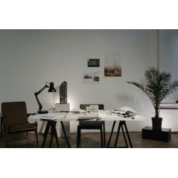 Minimalist architecture office with modern decor, white desk, and stylish layout.